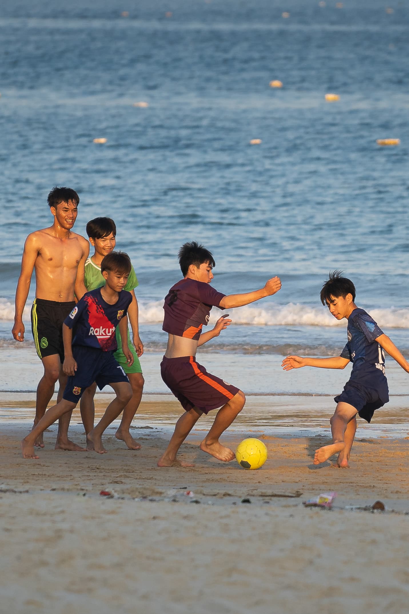 vietnamese boys playing soccer